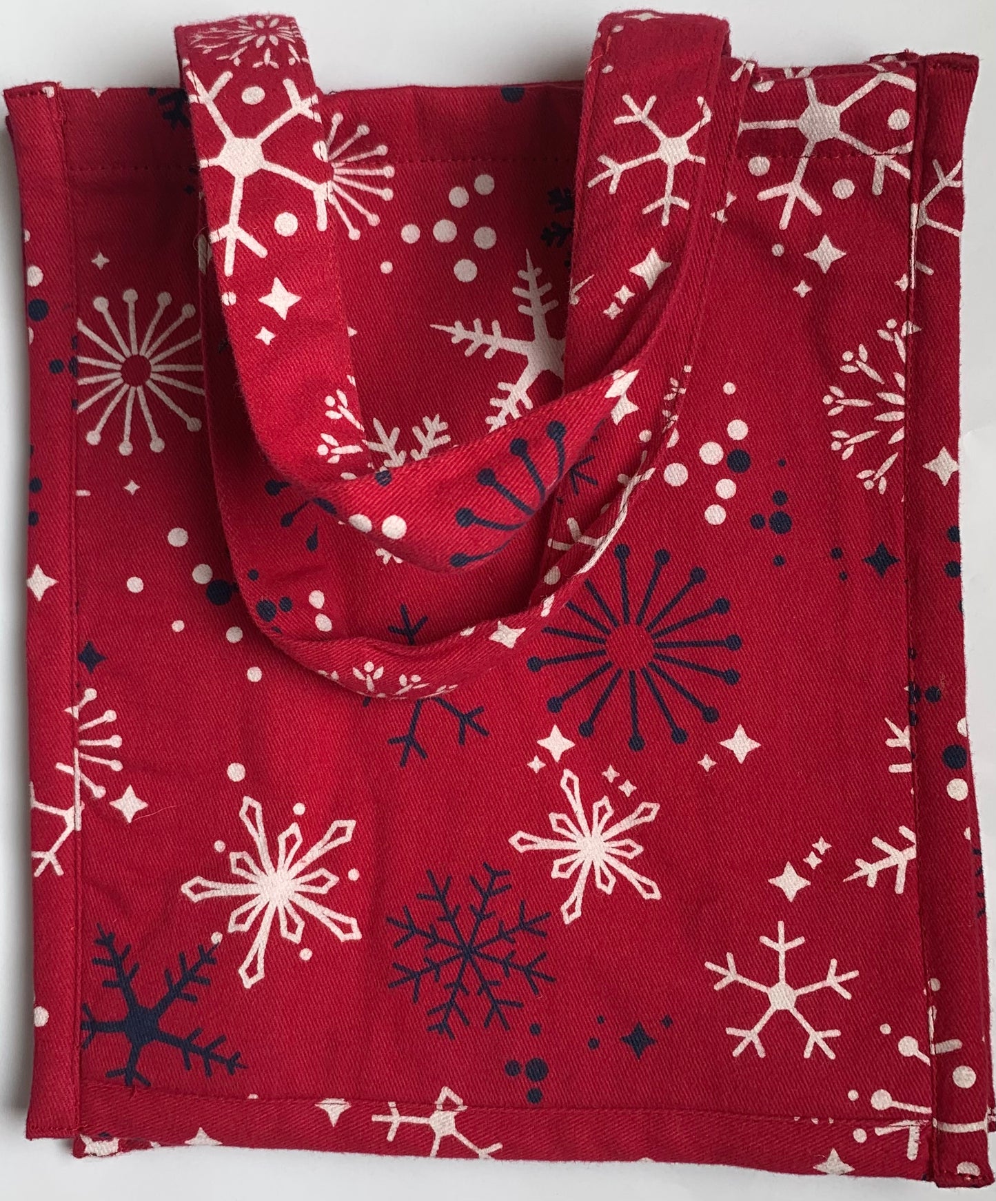 Snow Flakes on Red Gift Bag